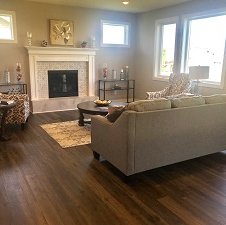 Hardwood Flooring Installation In A Living Room provided by Grand Design Floors in Maple Grove, MN